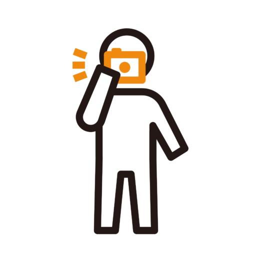 片手で写真を撮る