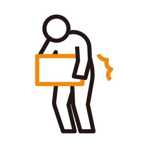 荷物を持ち上げようとして腰を痛める人